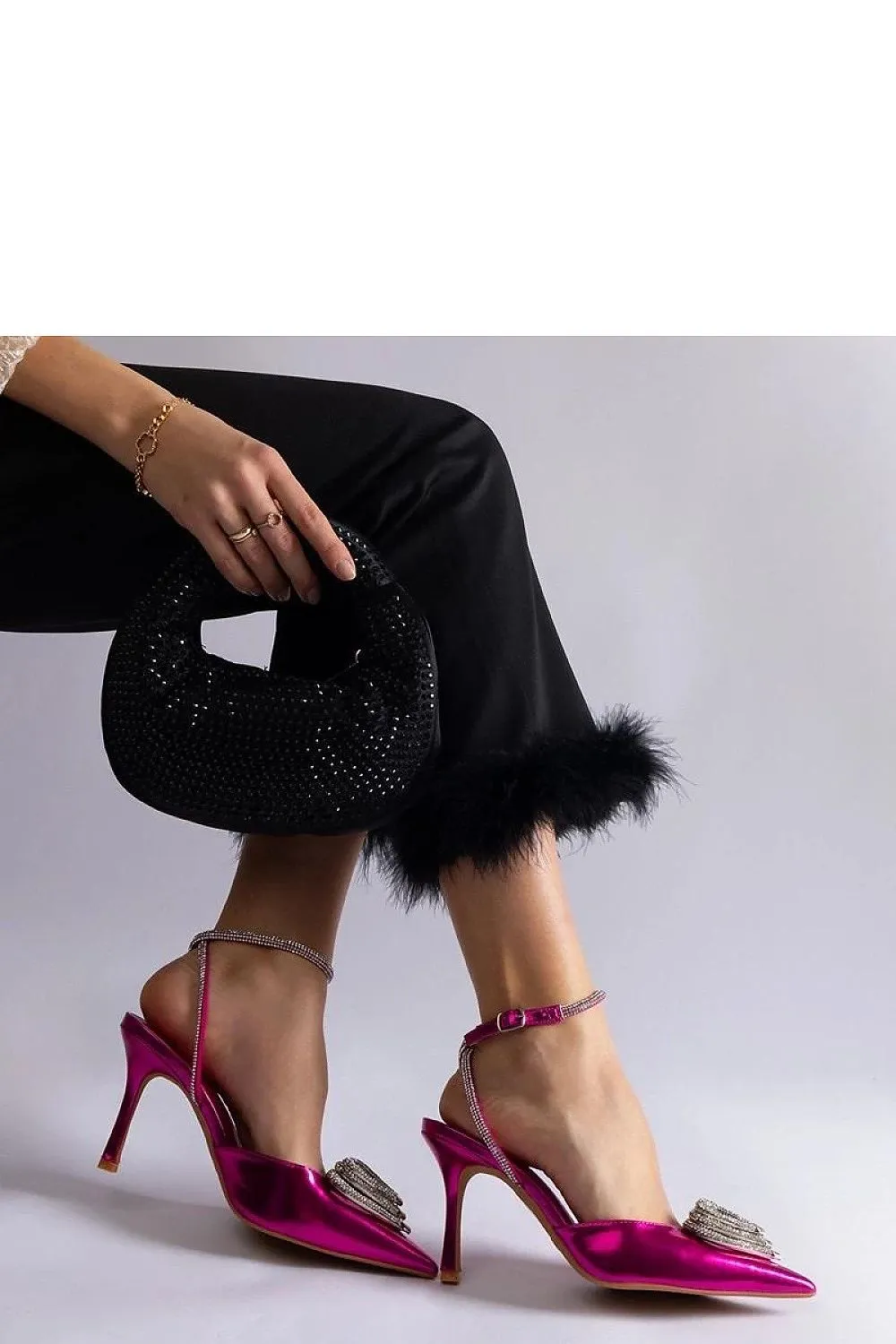 Exquisite golden pumps with an open heel