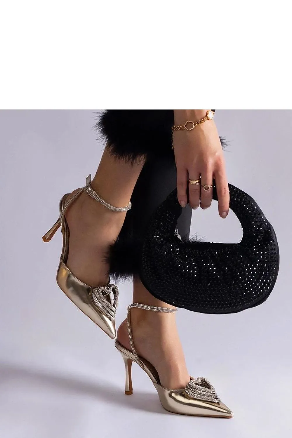 Exquisite golden pumps with an open heel