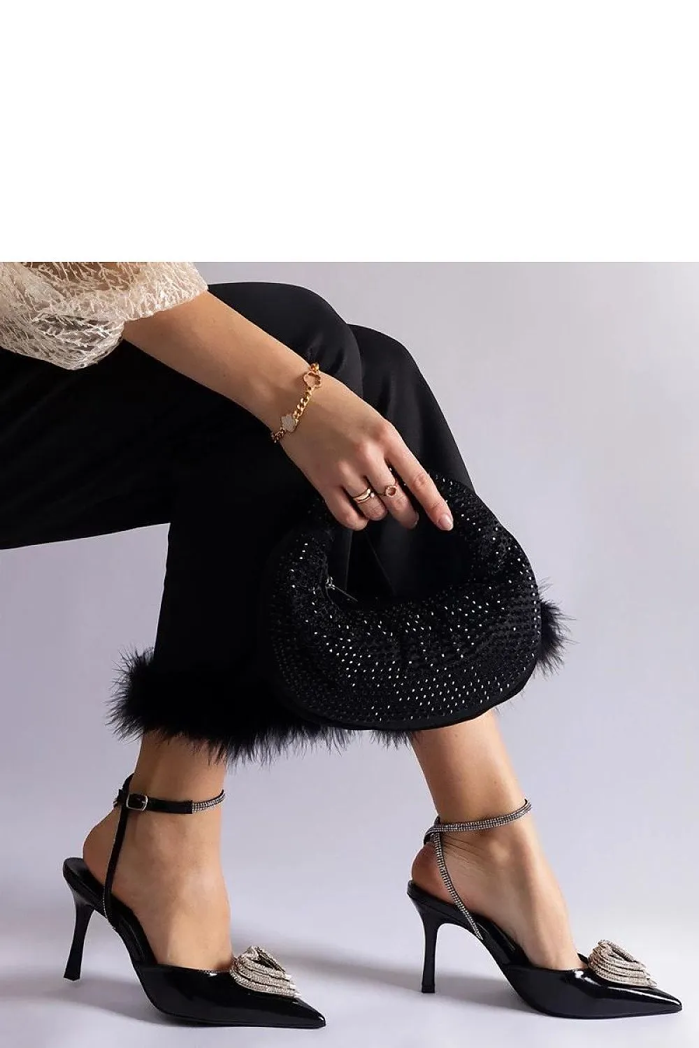 Exquisite golden pumps with an open heel