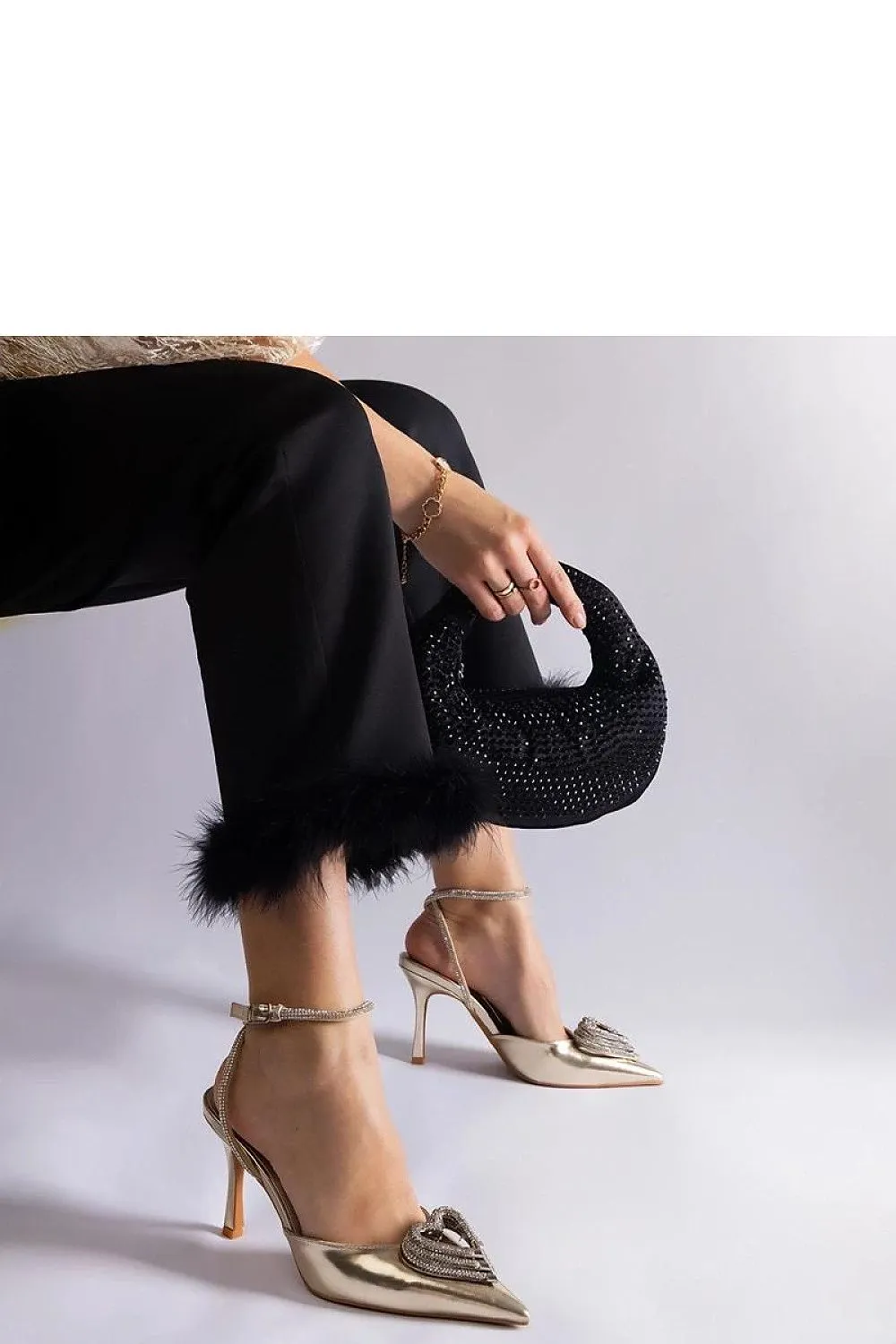 Exquisite golden pumps with an open heel
