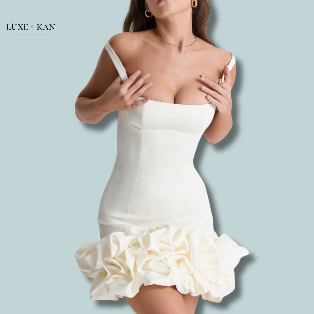 House of CB LILOU 
IVORY RUFFLE HEM DRES